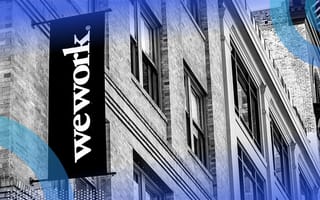 A WeWork sign on a building.