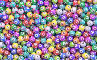 A pile of multi-colored lottery balls.