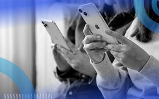 Two people looking at iOS apps on their phones.