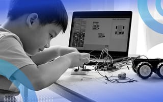 A child taking apart a toy.