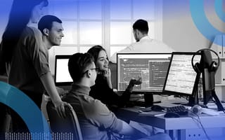 Software developers working together in an office.