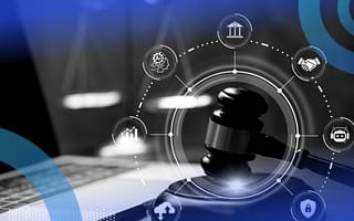 A gavel being banged with a circle around it illustrating different aspects of online safety, in front of an open laptop.