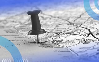 4 Things to Know Before Scaling Globally A close-up of a pushpin in a map.