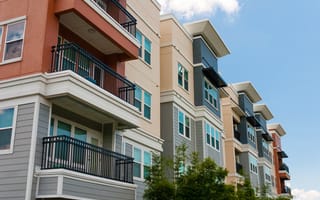 A modern apartment building is pictured.