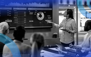 An executive leading a team in Big Data analysis.