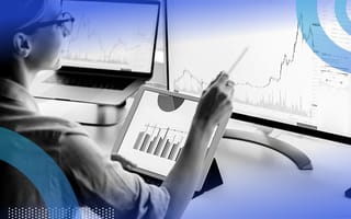 data analyst reviewing data points on computer