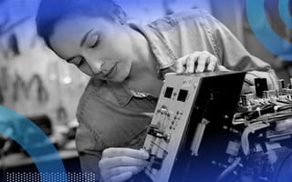 An inventor tinkering with an invention.