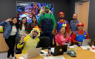 Pennymac Tech team members dressed as Mario Bros. characters