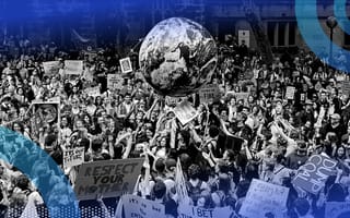 An environmental rally with a huge globe in the middle