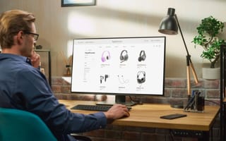 A person shops for headphones online.