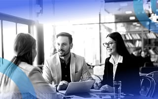 Two employers interviewing a job candidate in office