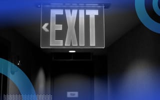 Glowing exit sign in hallway