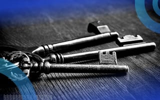 Set of three keys on a table