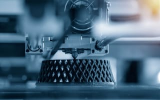 3D printer manufactures a product.