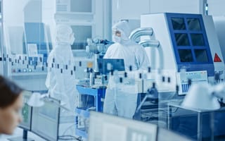 Scientists work in a medical lab.