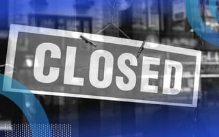 Closed sign in a business window