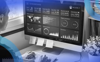 Digital marketer reviewing data on dashboard