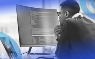 Developer reviewing code on computer