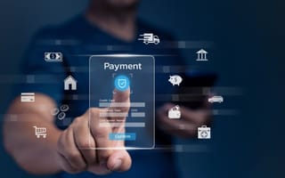 A person interacts with a hologram to initiate a digital payment.