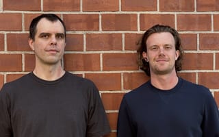 UserHub's co-founders are pictured in a photo together.