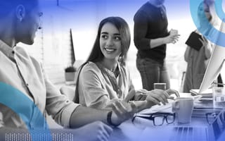 Employees working together in office