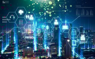 A digital array of various tech symbols over a nighttime city backdrop