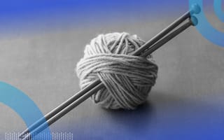 Ball of yarn with knitting needles representing python string