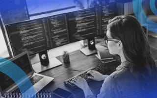 Developer coding in java on multiple screens