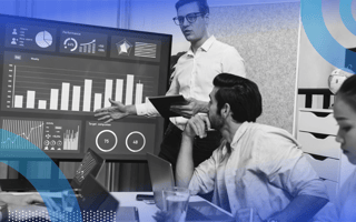 How Generative AI Is Transforming Text Data Extraction Team reviewing data analysis reports on a monitor