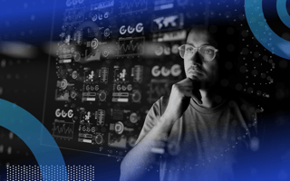 A man looks pensively at data visualizations