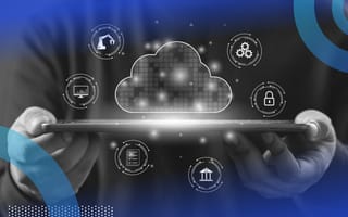 Someone holding an iPad with a holographic cloud and security symbols floating above and around it.
