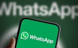 Phone with WhatsApp mobile application open.