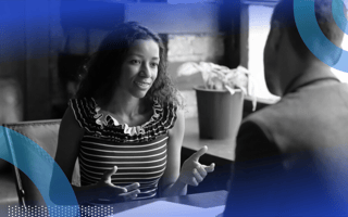 Is Skills-Based Hiring the Best Way to Build a Tech Team? A candidate in an interview talking to their interviewer.