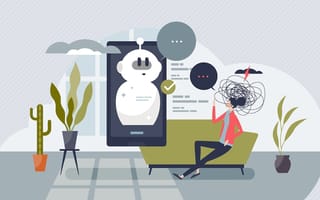 A robot speaks to a patient on a therapist’s couch