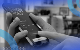 A smartphone with the text "Building a better world"