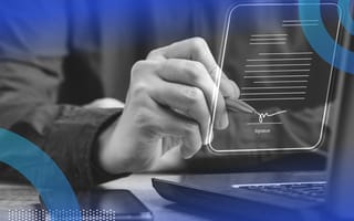 How Smart Contracts Could Transform the Workplace Someone signing a holographic contract meant to represent smart contracts.