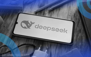 A mobile device displaying the DeepSeek logo.