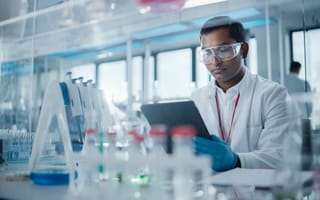 Lab staff works on new pharma product.