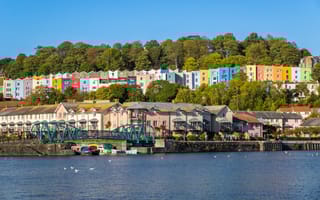 Rows of colorful terraced houses in Cliftonwood, Bristol, England.
