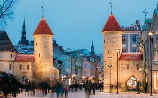 Viru Gate in Tallinn, Estonia with a blurred crowd in the foreground.