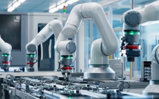 A robotic arm on a factory line to represent automation.