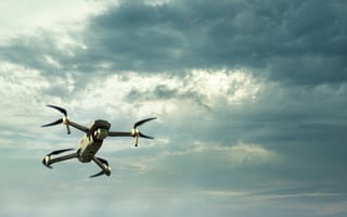 Drone flying among the clouds.