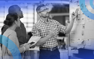 Employees white boarding innovative solutions