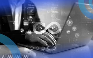 A developer works on a laptop with a DevOps logo