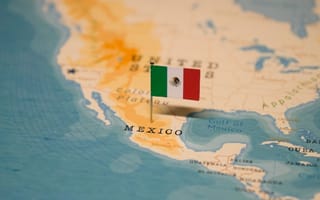 Mexico's flag overlaid on map of the country
