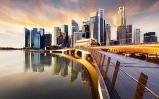 A photo of the Singapore skyline is shown.