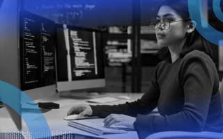 Cybersecurity professional working on a computer