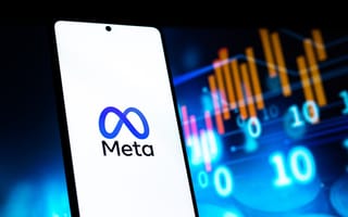 A phone showing Meta's logo is pictured.