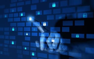 A finger presses a glowing digital lock icon on a blue screen filled with similar lock symbols, symbolizing online security and data protection.