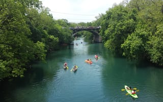 People kayaking on Lady Bird Lake in Austin, Texas